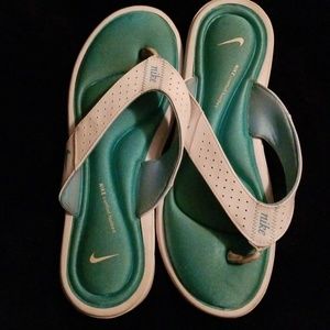 Blue nike padded flip flops